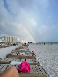 rainbow and beach chairs that are included with the condo but they will have cushions and umbrellas during the day