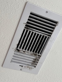 All of the vents and returns looked like this. Everything was covered with dust.