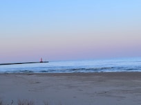 Sunset looking at the pier and Lighthouse that’s near