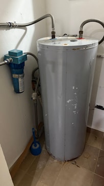 water heater rusty and dirty room