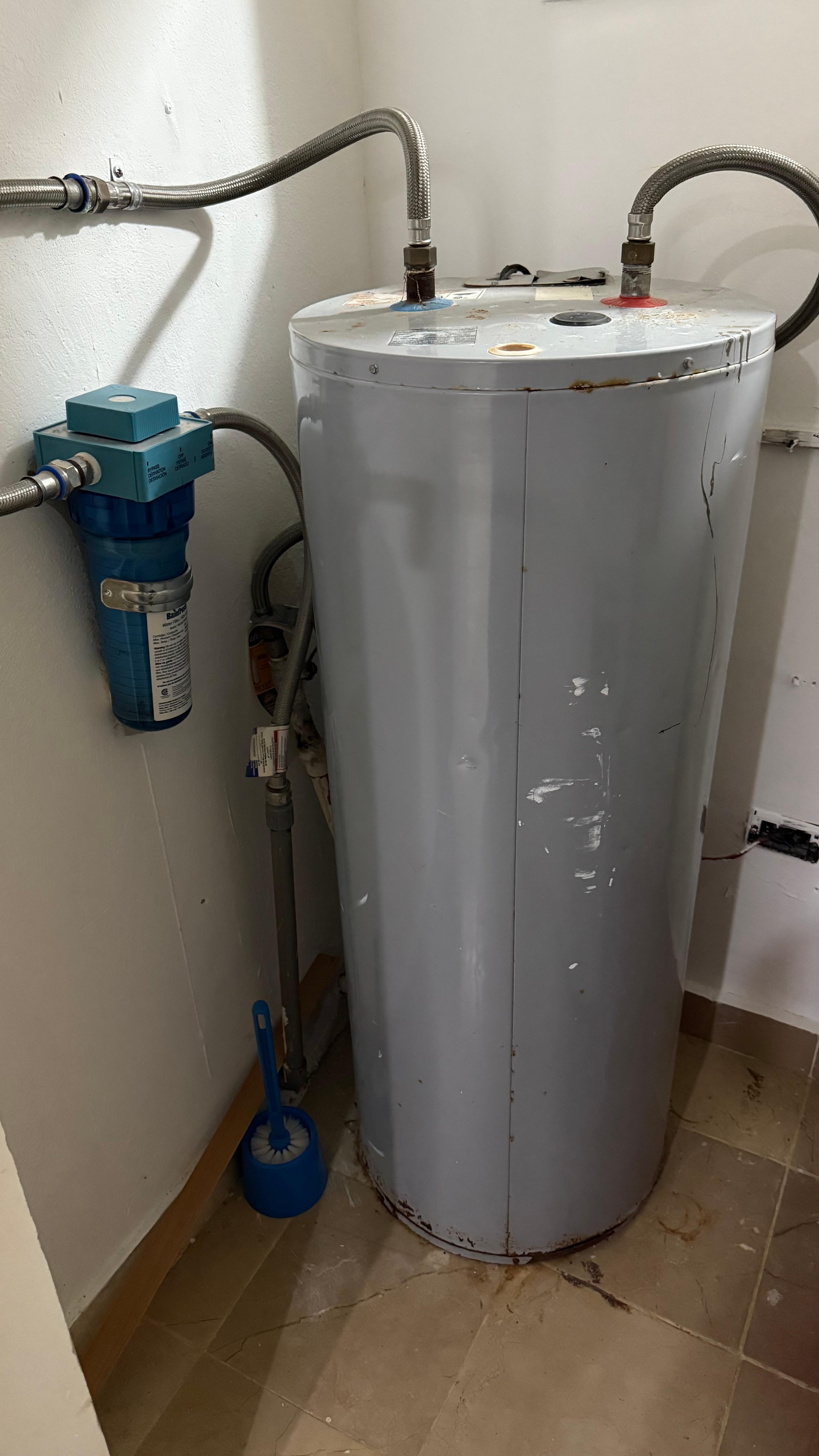 water heater rusty and dirty room