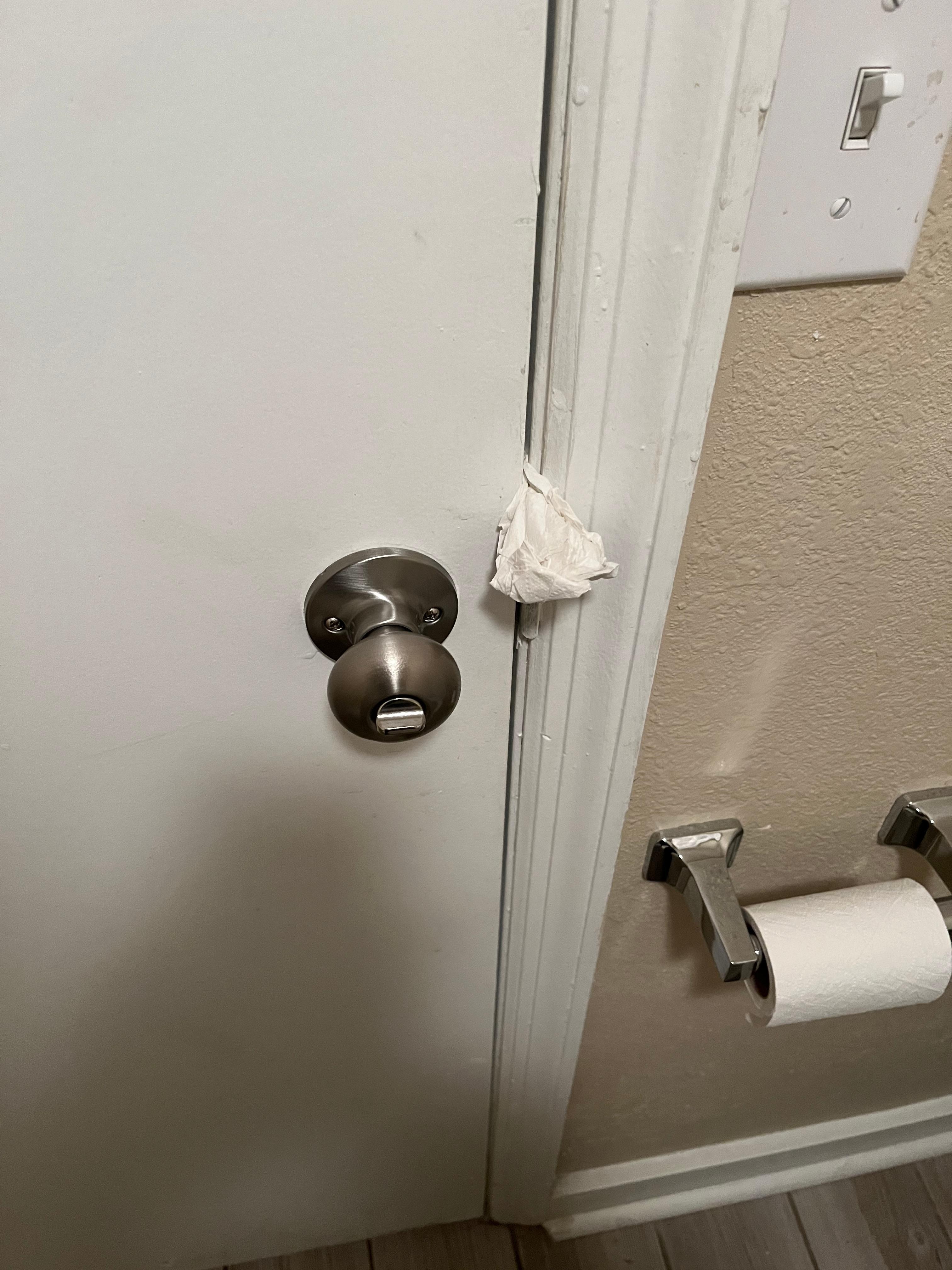 Bathroom door wouldn’t stay shut unless I used some paper to help 