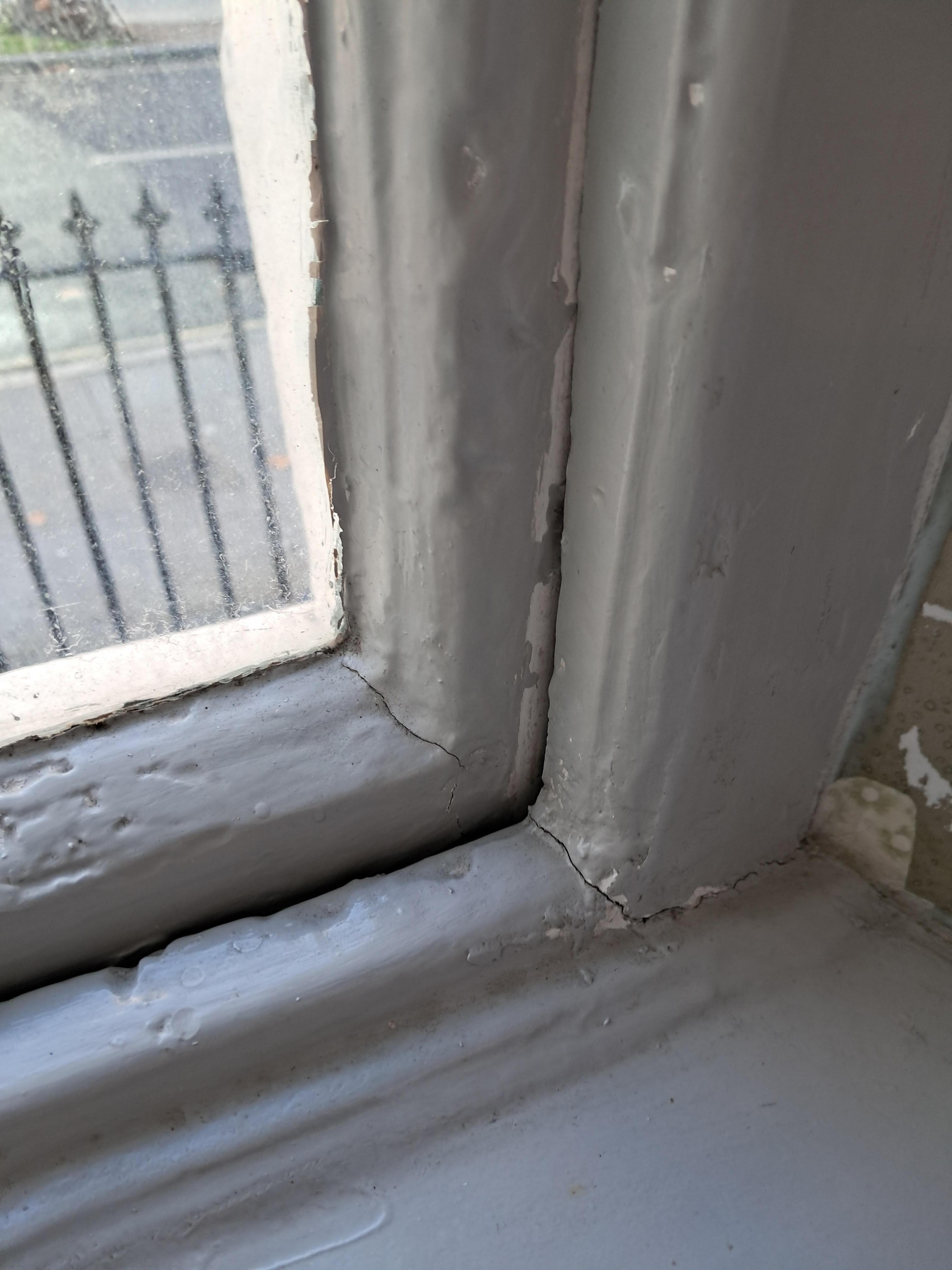 Broken window pane letting in cold air