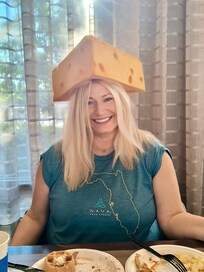 A family tradition we always grab a photo with the cheesehead hat in the breakfast room.