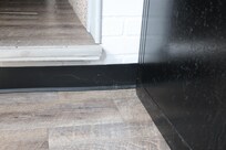 Spider webs inside the house near the kitchen on the stair