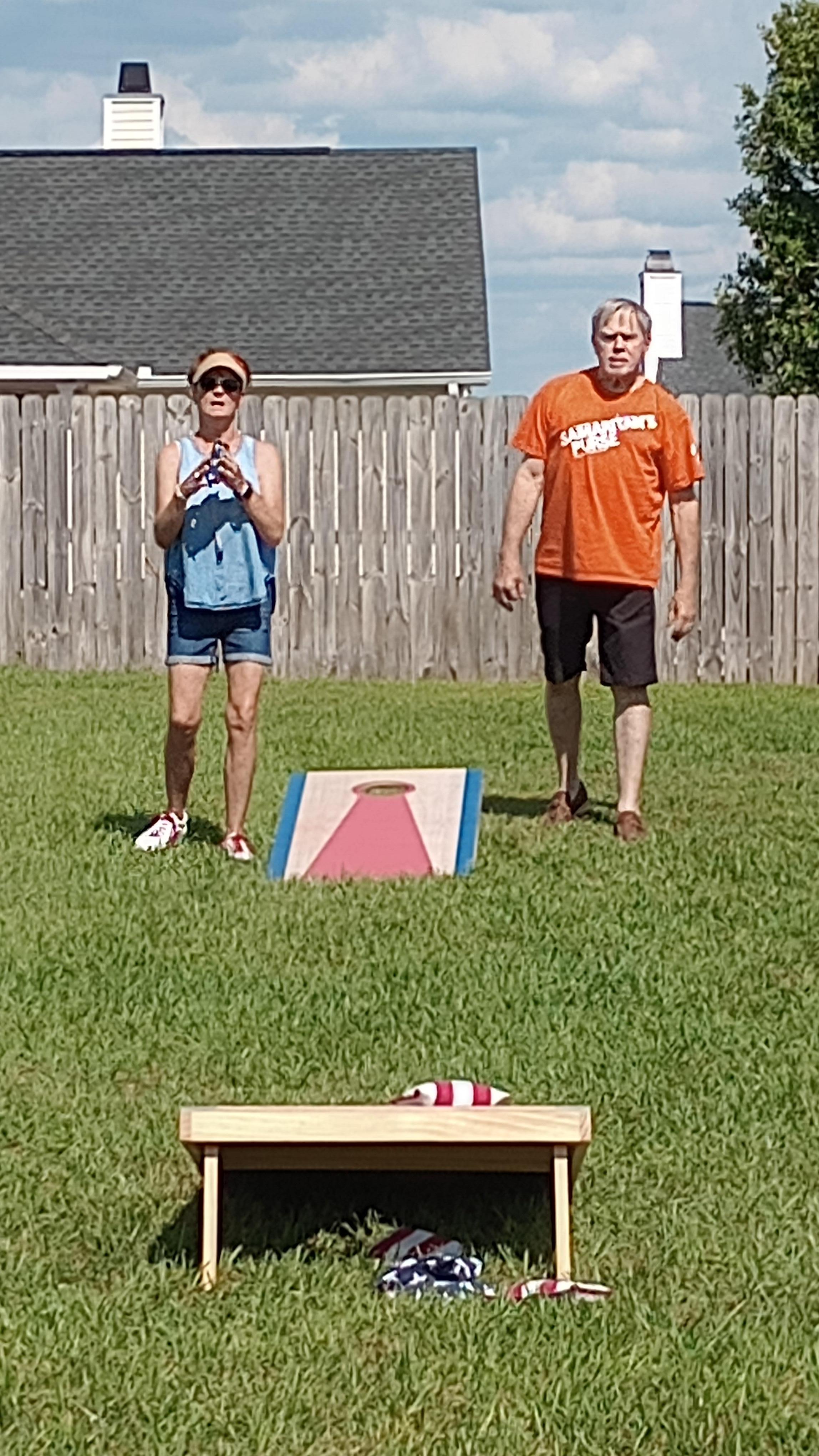 Brought a cornhole game! Enjoying the backyard