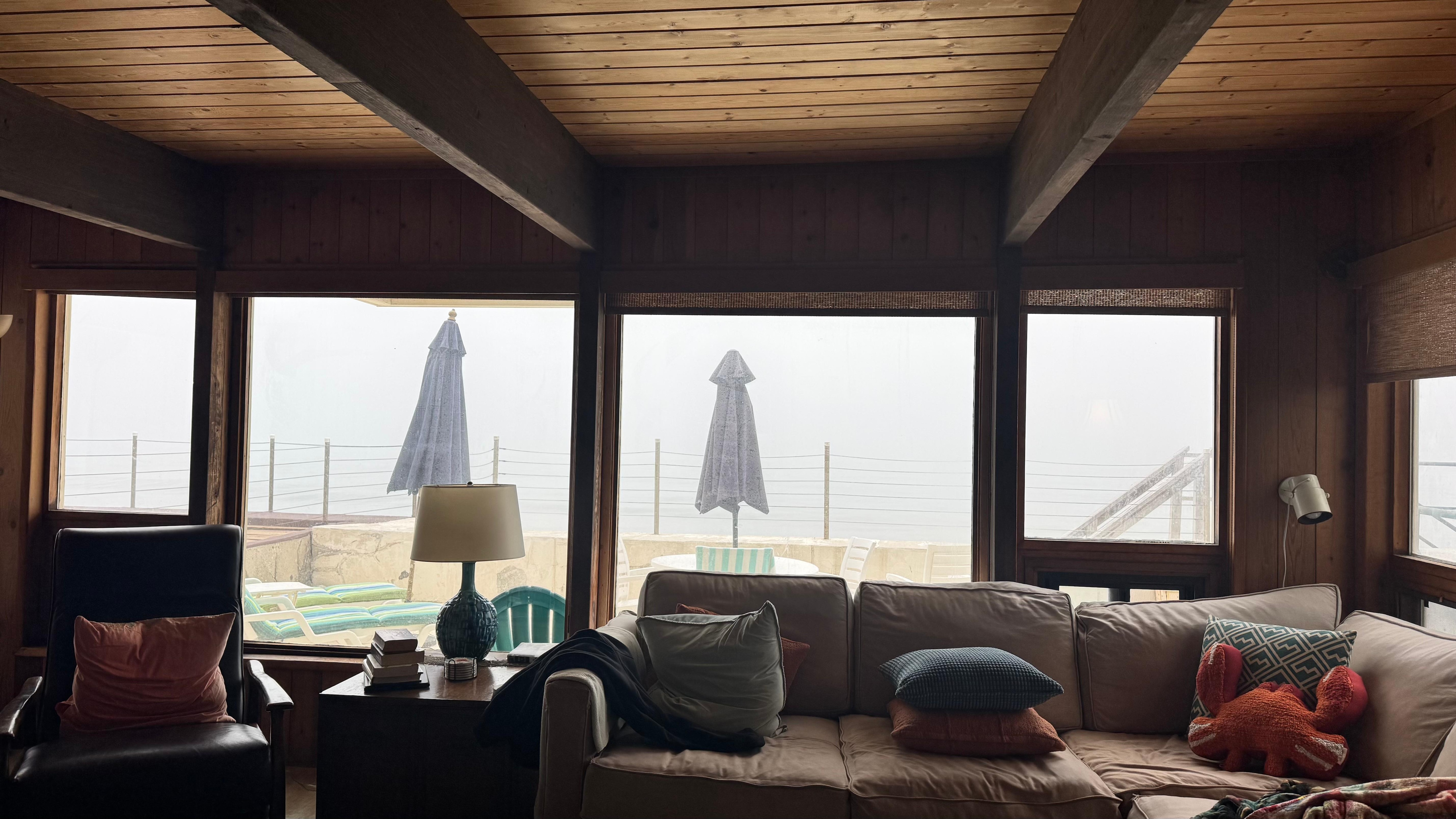 View from the dining room to living room & outdoor deck 