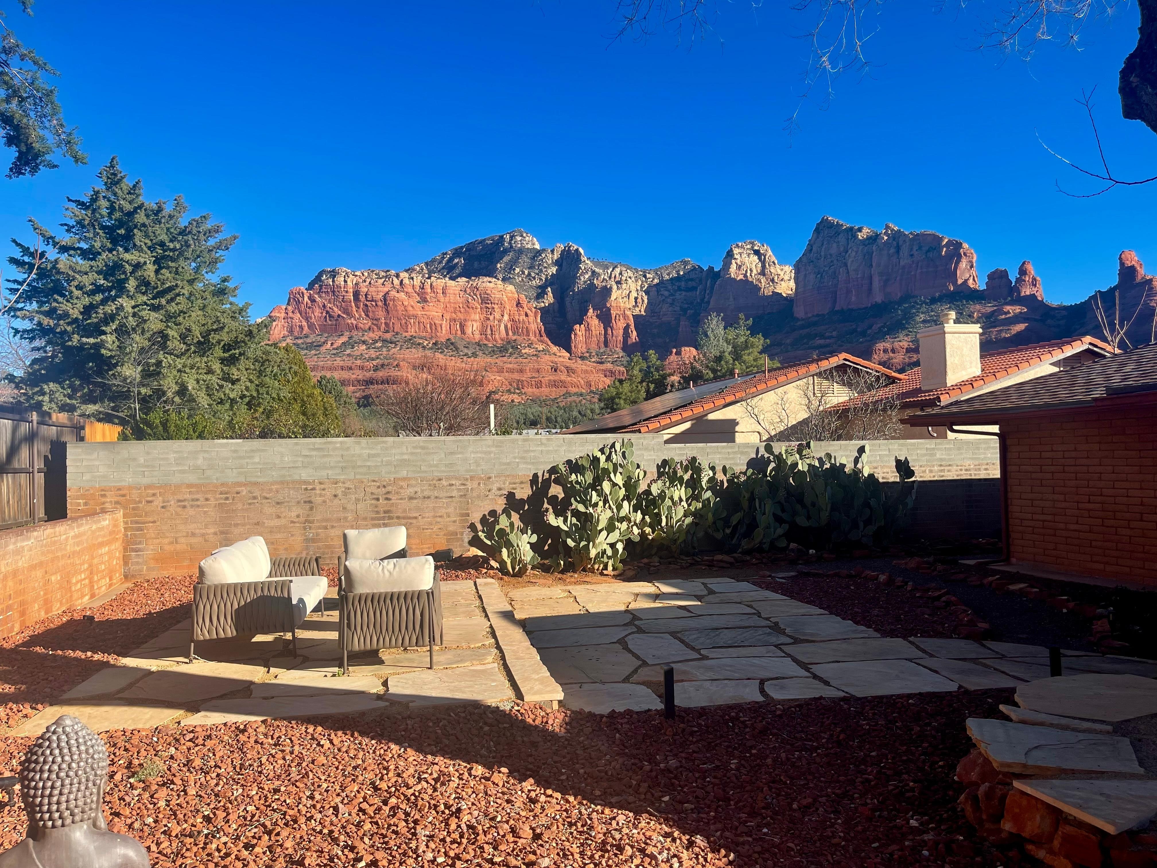 Cup of hot coffee adds to this morning view from the backyard.
