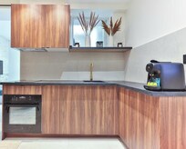 This is the kitchen. No dishwasher, no microwave. The oven is a conventional oven and it functions properly.