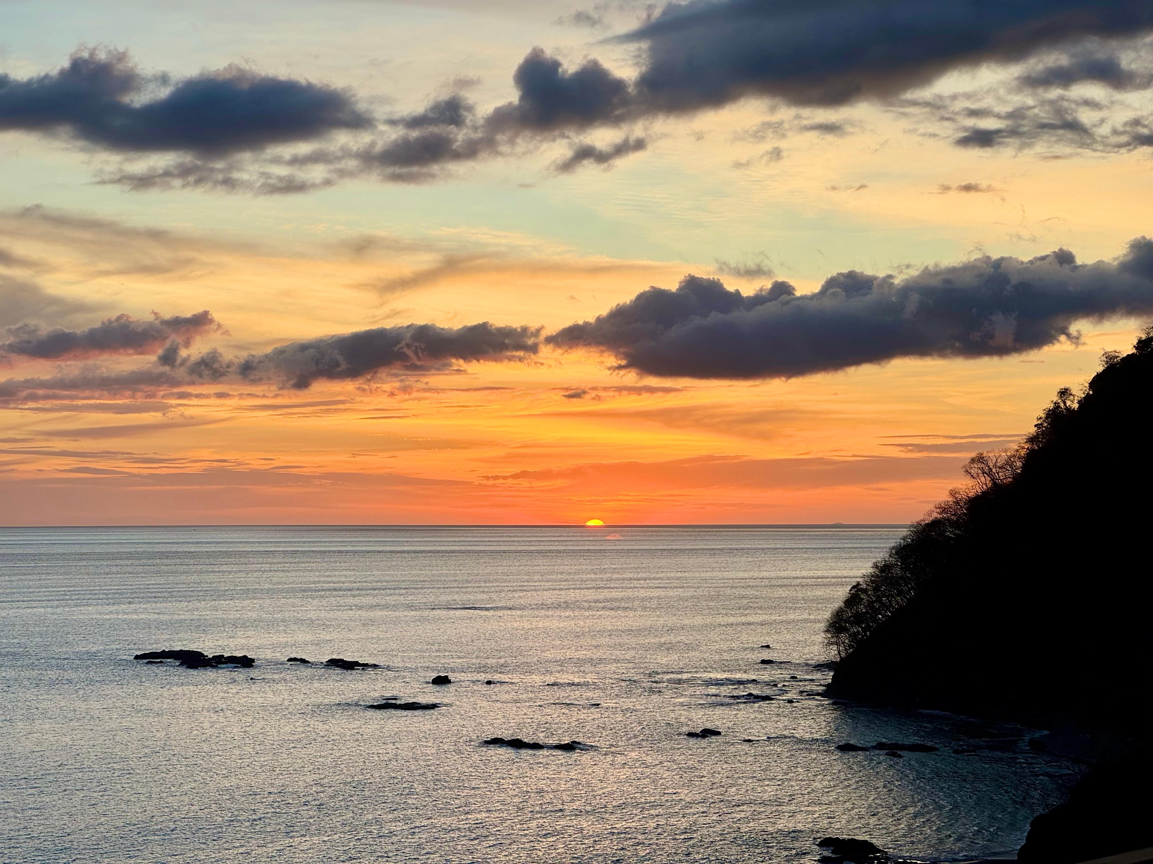 Balcony view of sunset over the pacific.