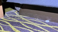 Bottle cap and Cheetos on carpet