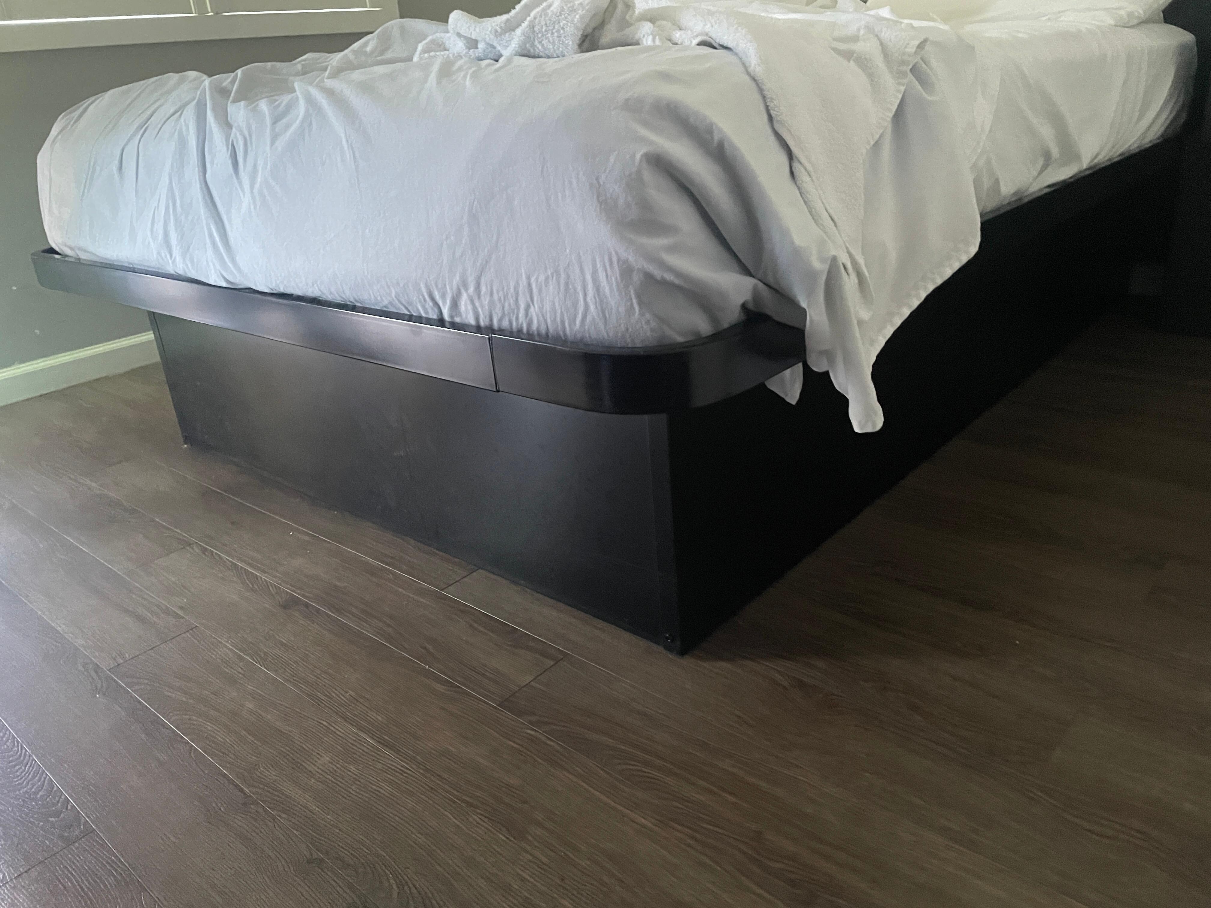 Mattress propped up on metal 