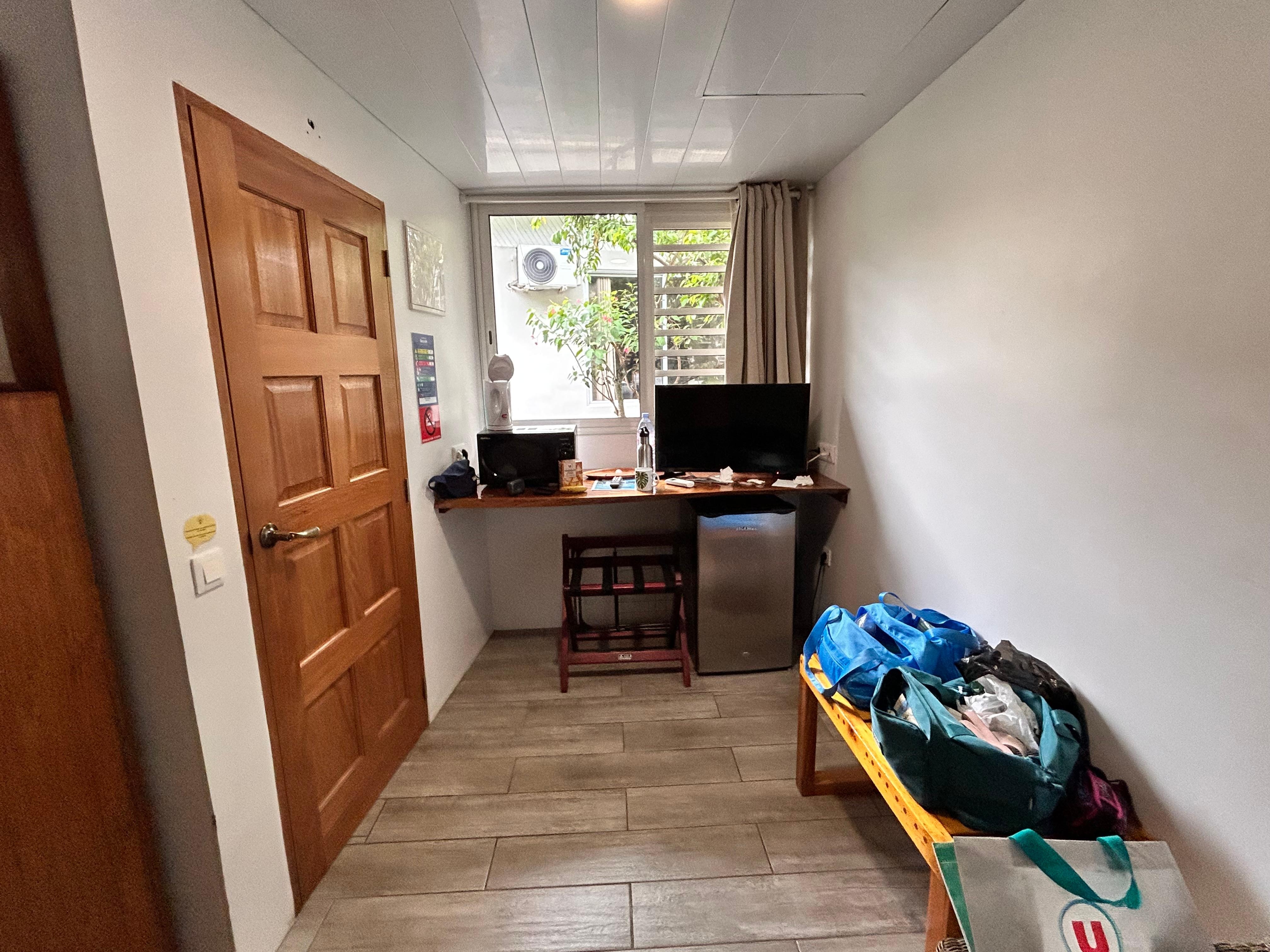 The entryway taken from the foot of the bed 