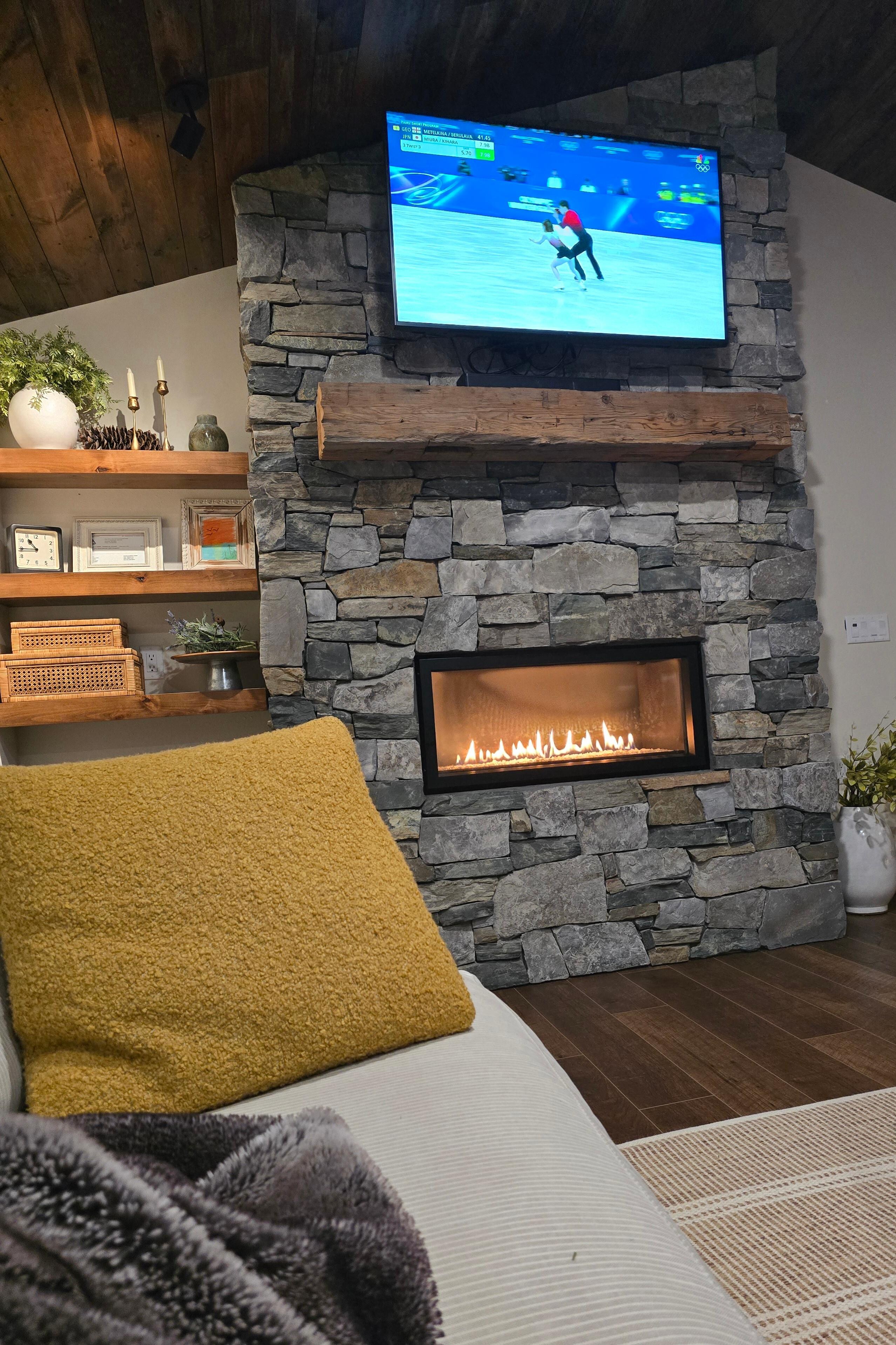 Watching the Olympics with the cozy fireplace on🎶