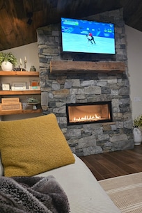 Watching the Olympics with the cozy fireplace on🎶