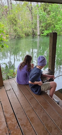 Fishing of the back deck. We could see the fish, they were laughing at us. But we had fun
