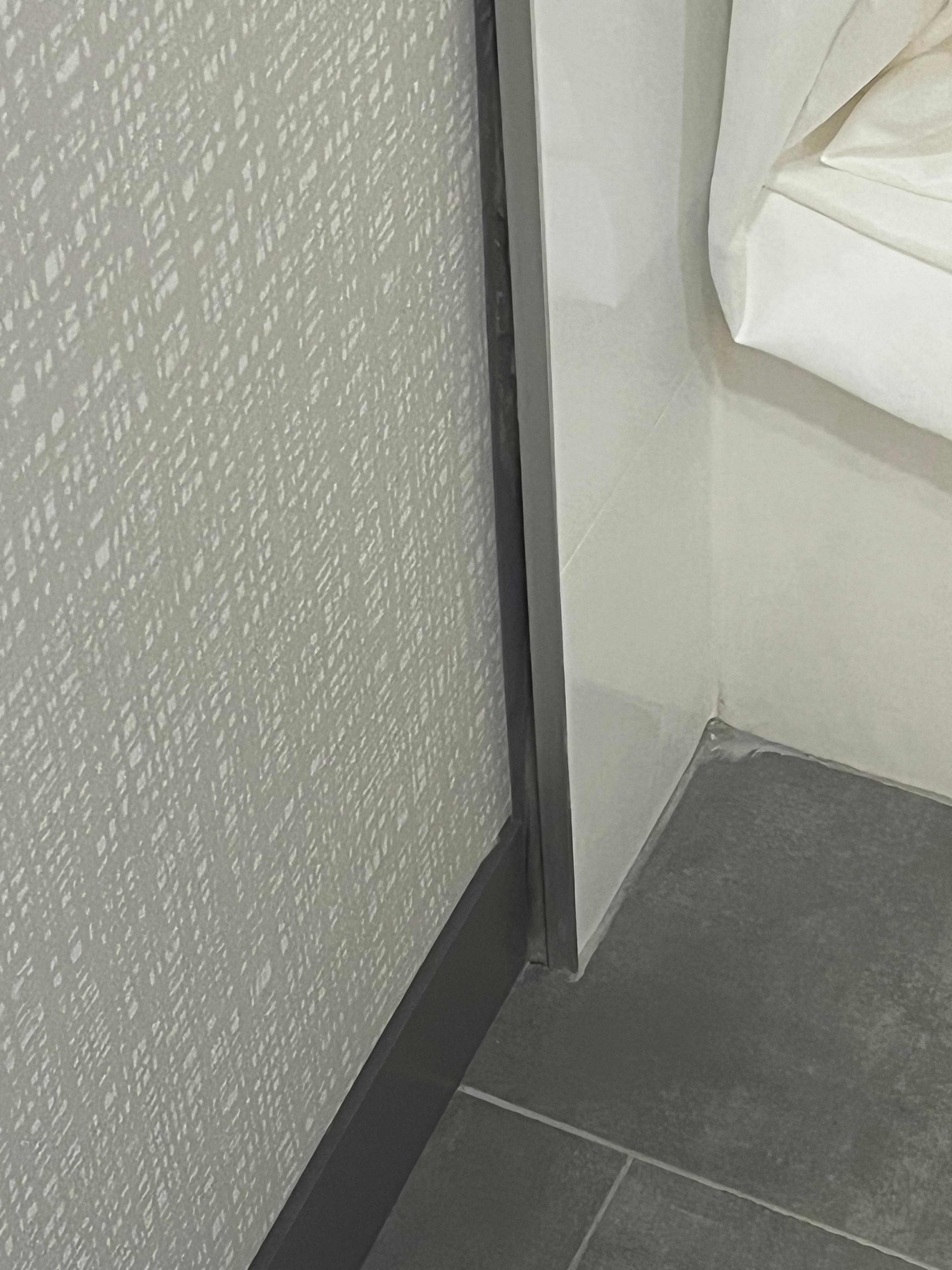 Shower not up against the wall. Probably fine but 🤷‍♂️