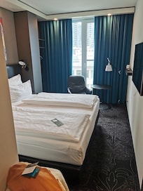 Zimmer mit bequemen Bett