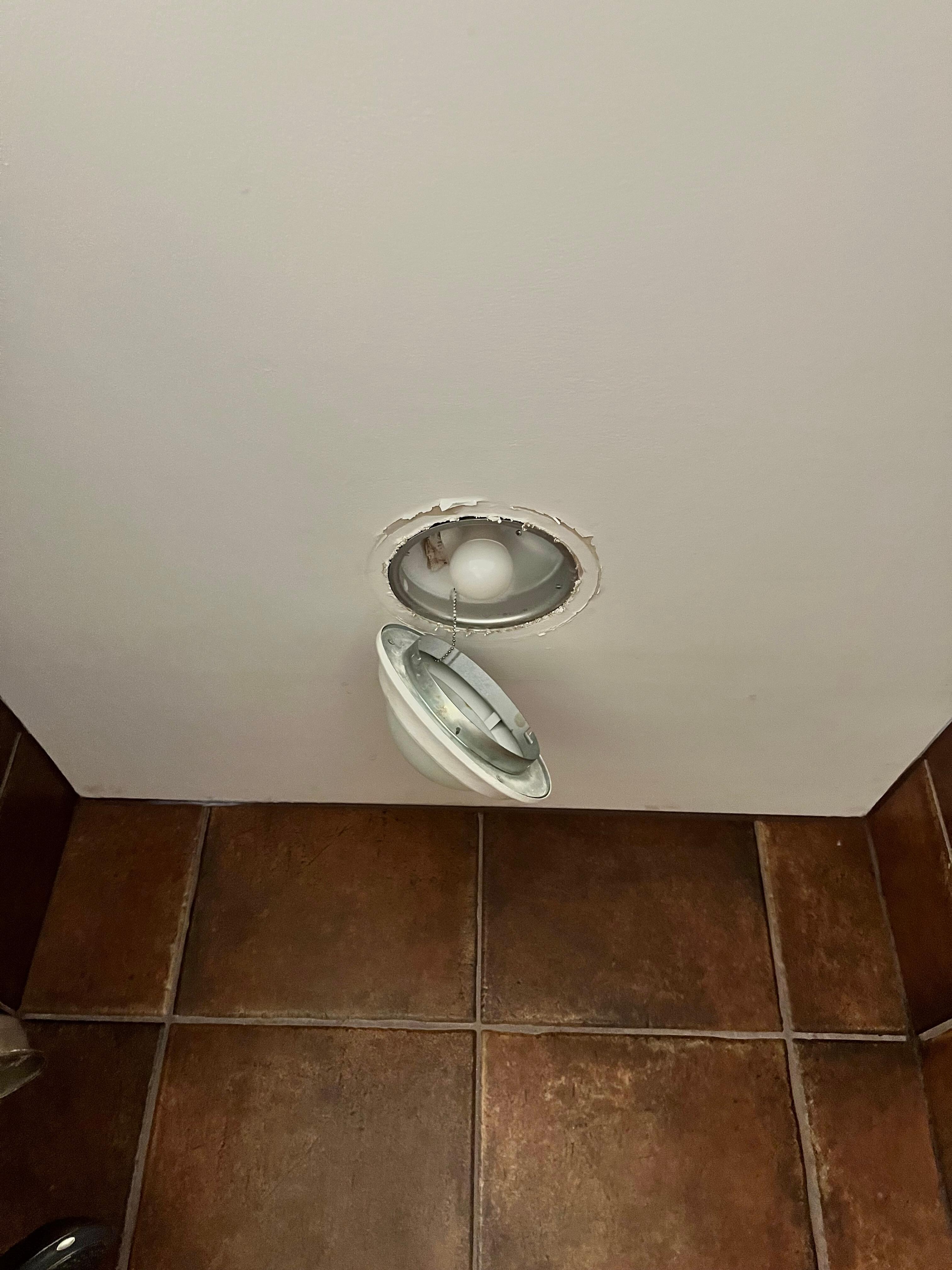 This was what happened by itself in the shower! My husband propped it back up. The ceiling paint was all over shower floor!! There was hardly any cooking supplies. The stove was dirty and the sink
Was old. Not too happy 