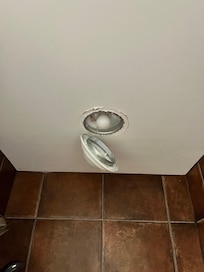 This was what happened by itself in the shower! My husband propped it back up. The ceiling paint was all over shower floor!! There was hardly any cooking supplies. The stove was dirty and the sink
Was old. Not too happy