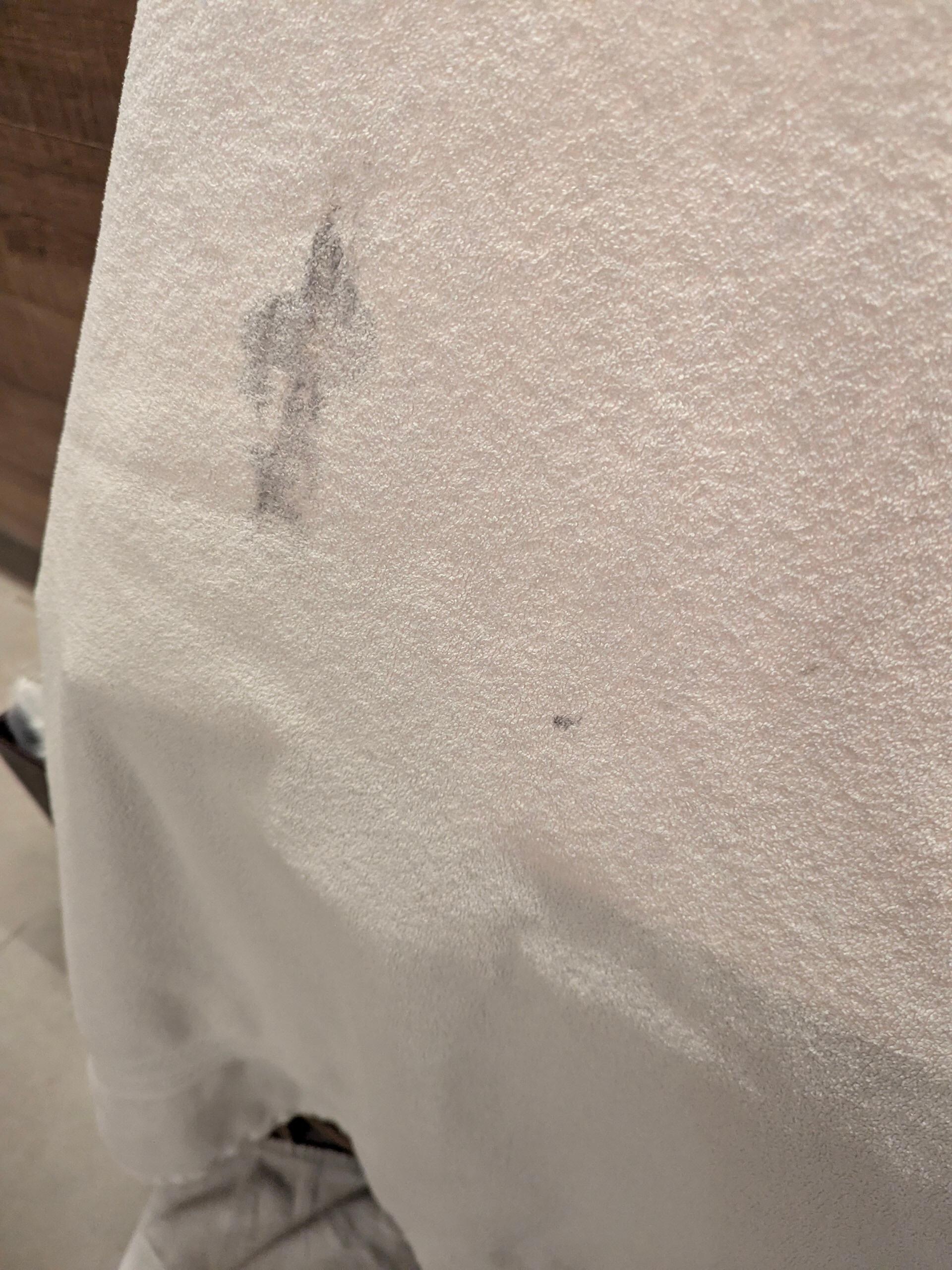Hole and Grease on bath towel