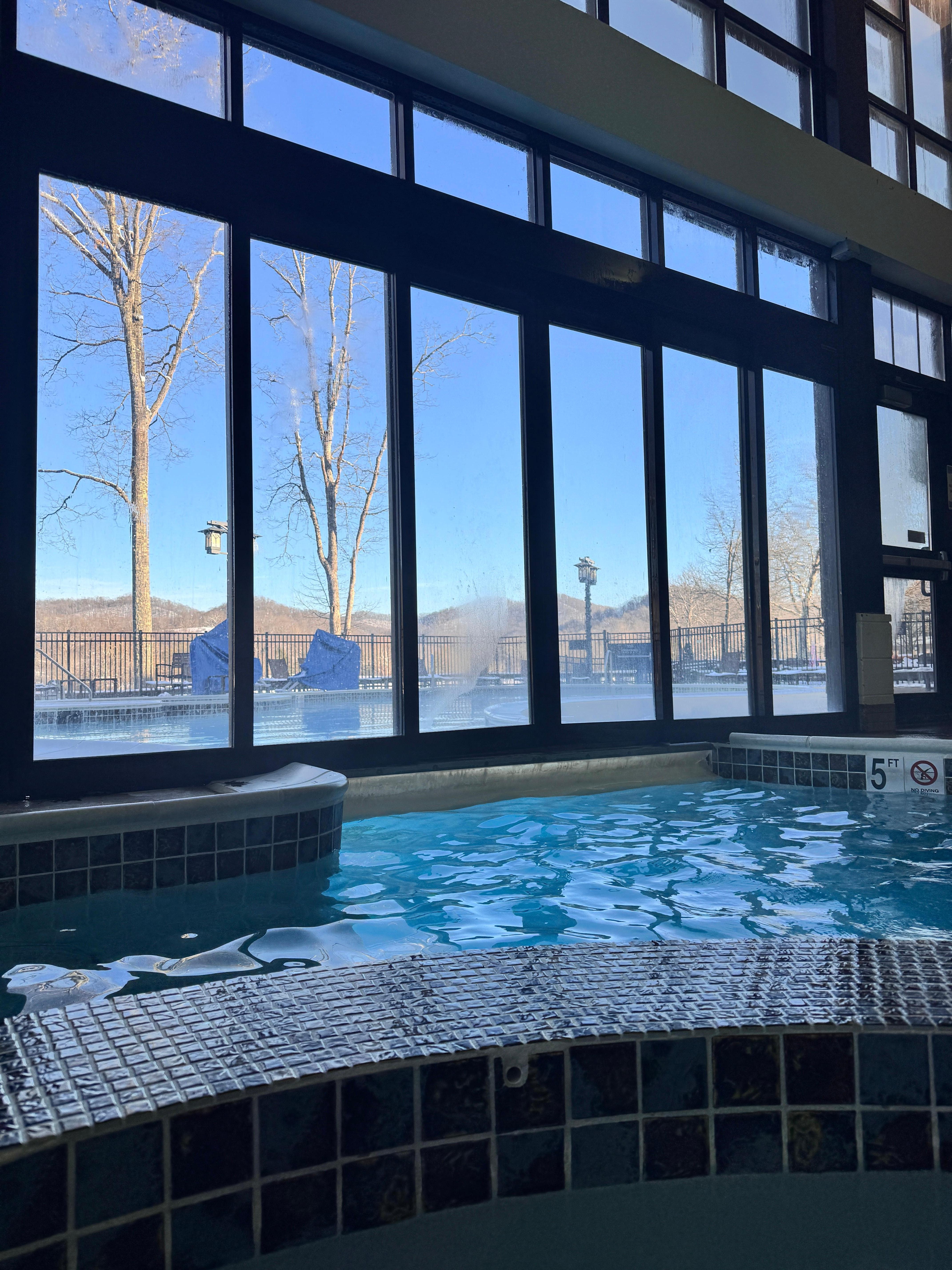 Winter view at the pool/hot tub.  Hoping they have plans to give the area a renovation and scrape all the green mold off the window sills.  They were covered.