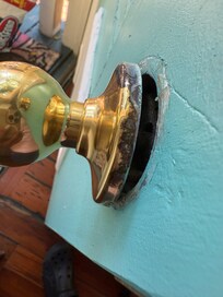 The back door knob is about to fall off and the door jam is loose!