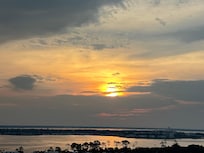 Sunrise over the bay from the front door!