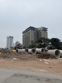 Hotel building with surroundings.