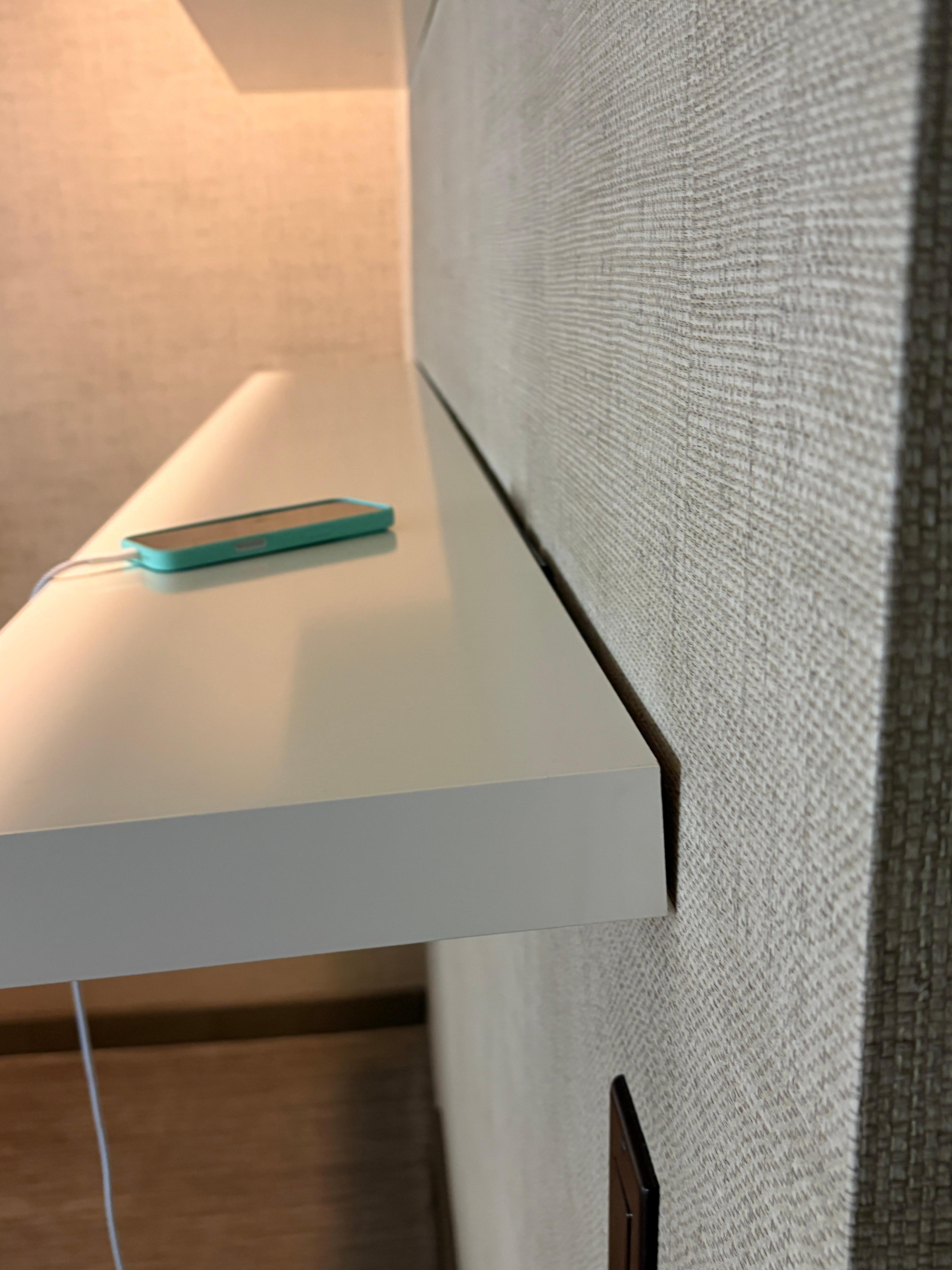 Shelf falling off the wall. 