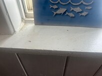 Winter , sand on window sills