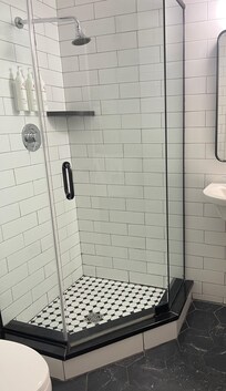 Bathroom is very small but modern