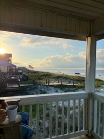 Morning coffee in the sun rising in the east