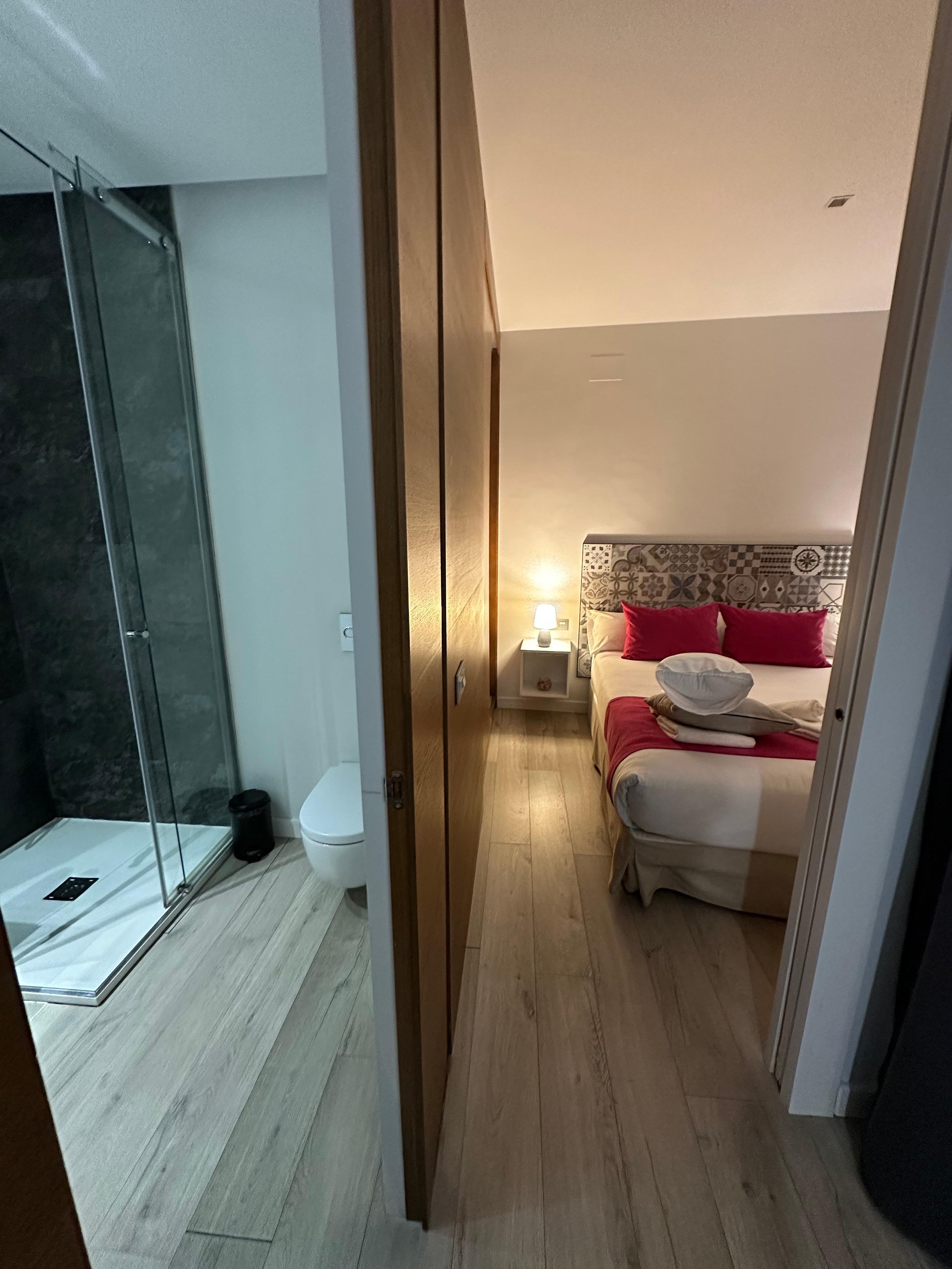 Bedroom and bathroom in apartment 23