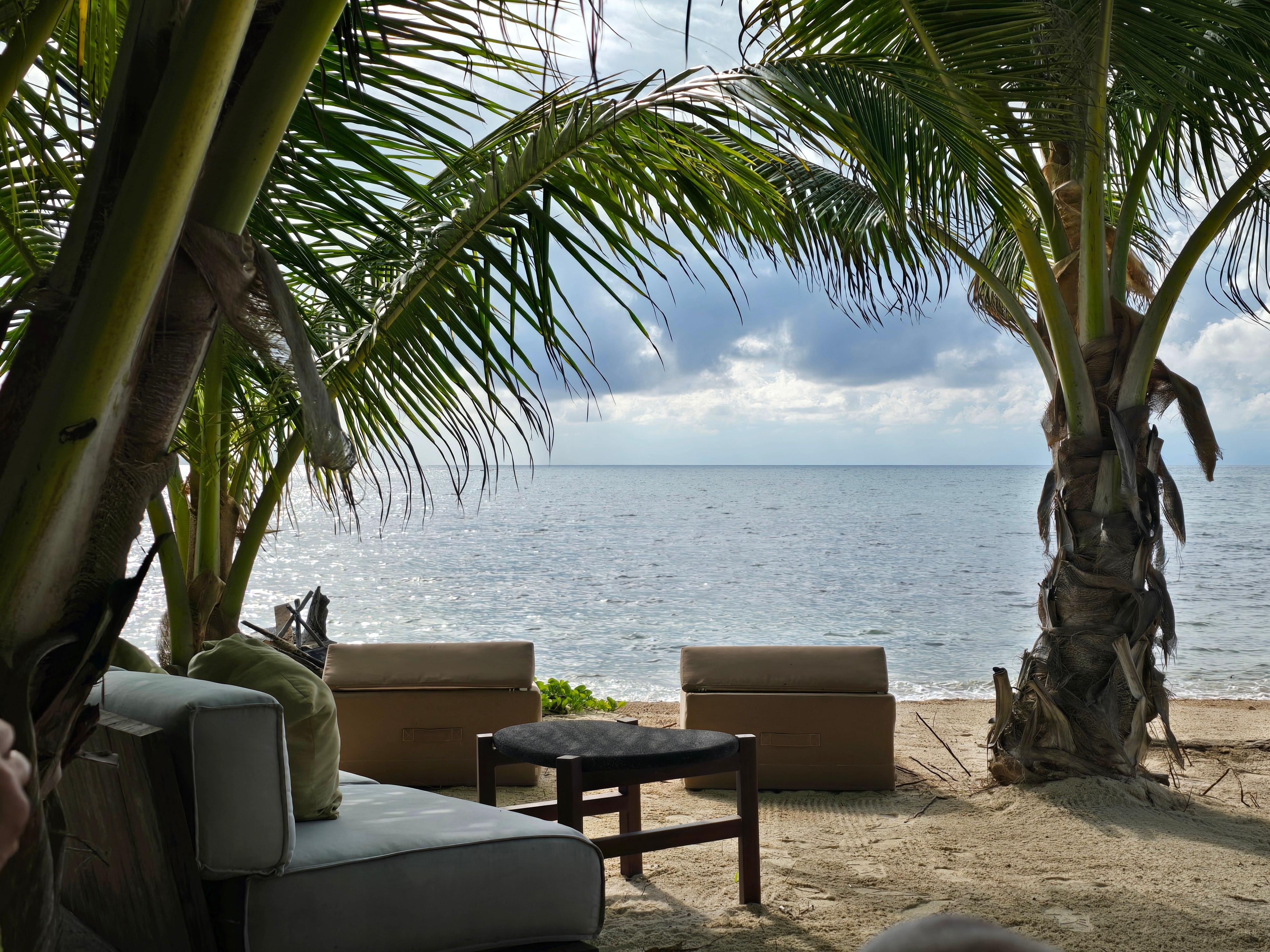 Beach view from sofas. 