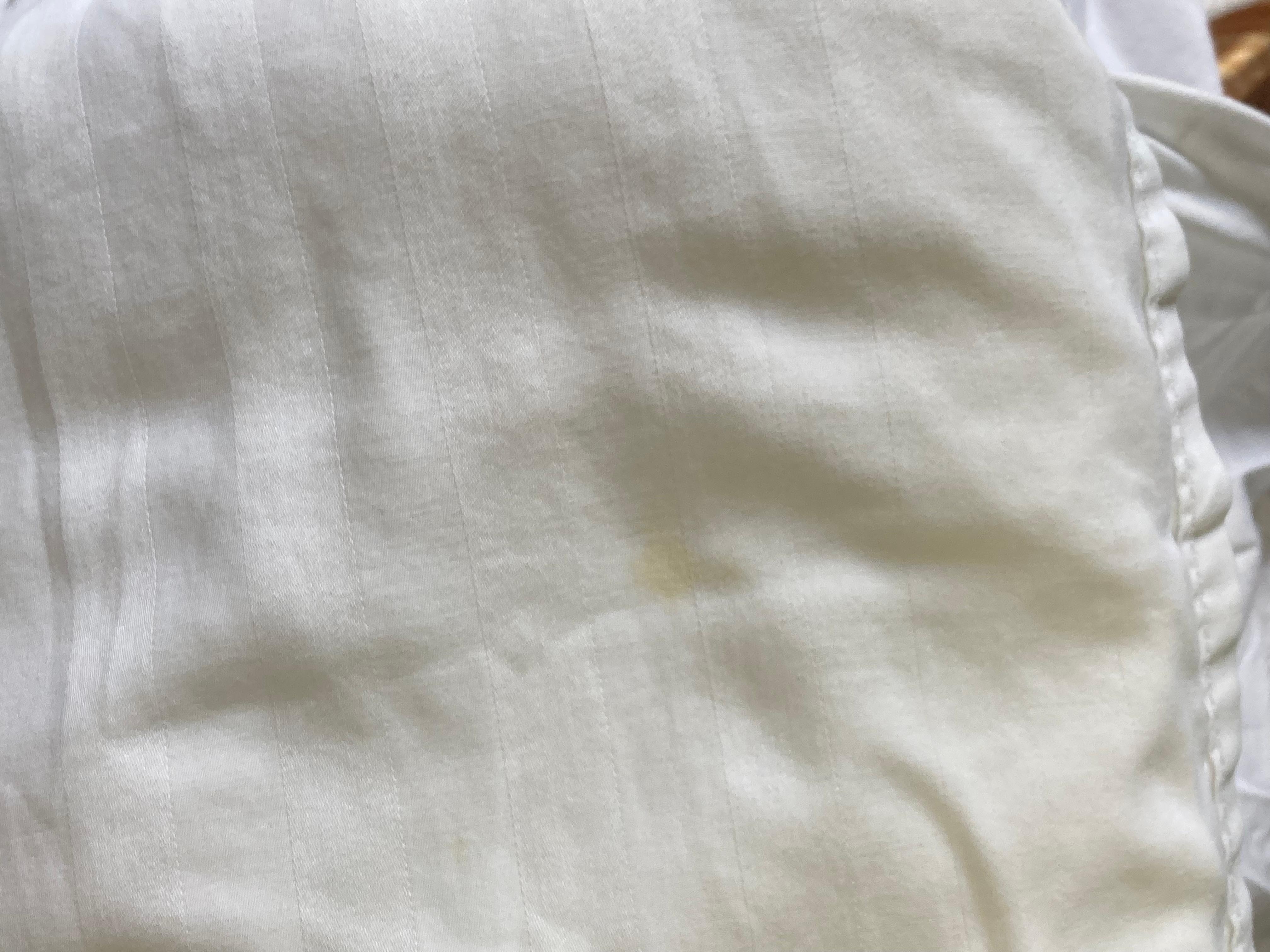 Stains on bedding the whole comforter was yellow with a white sheet on top 