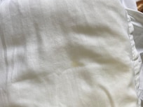 Stains on bedding the whole comforter was yellow with a white sheet on top