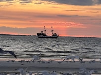 Evening ship sailing by