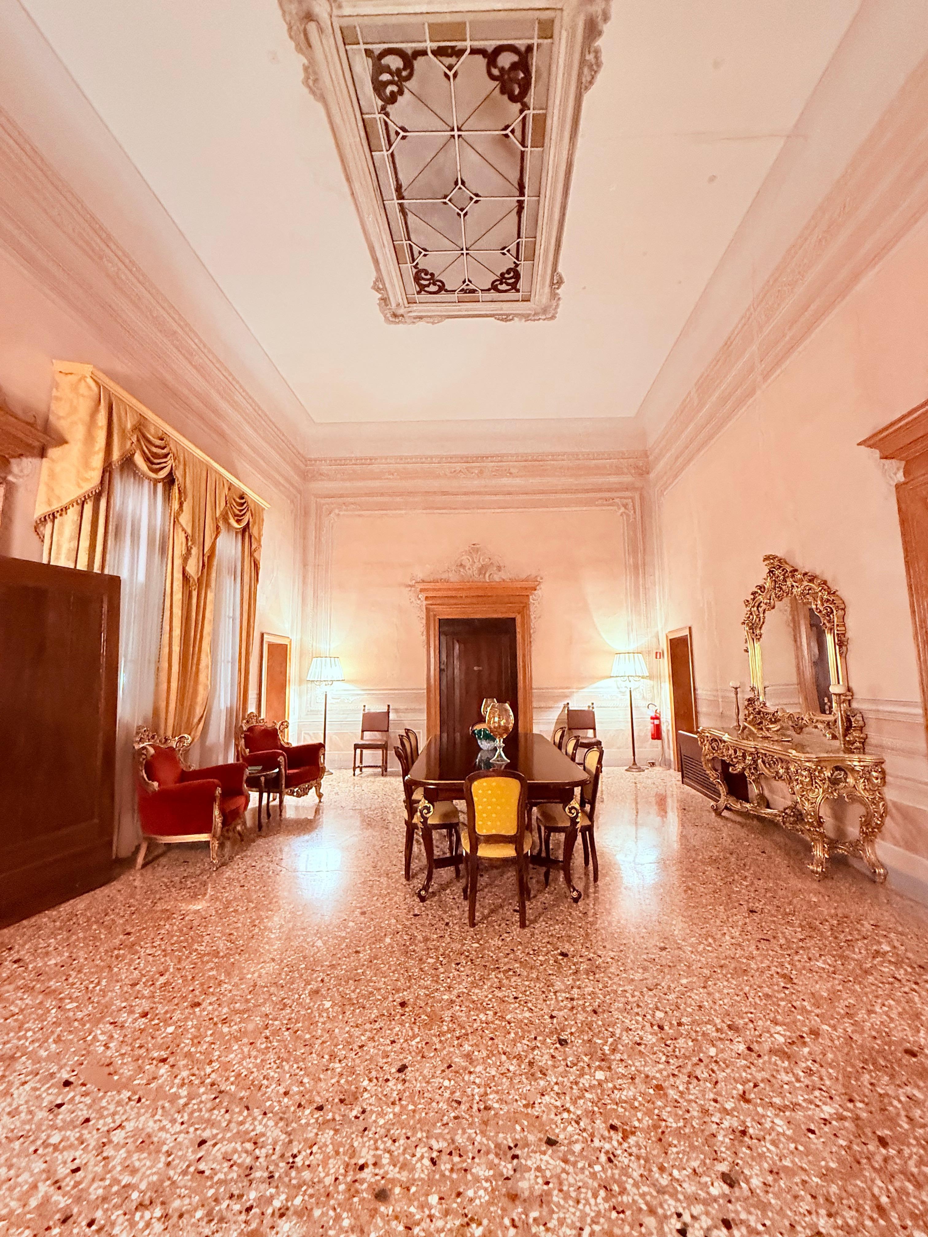 Huge sitting area, was once the dining room palace. Place has a lot of history.