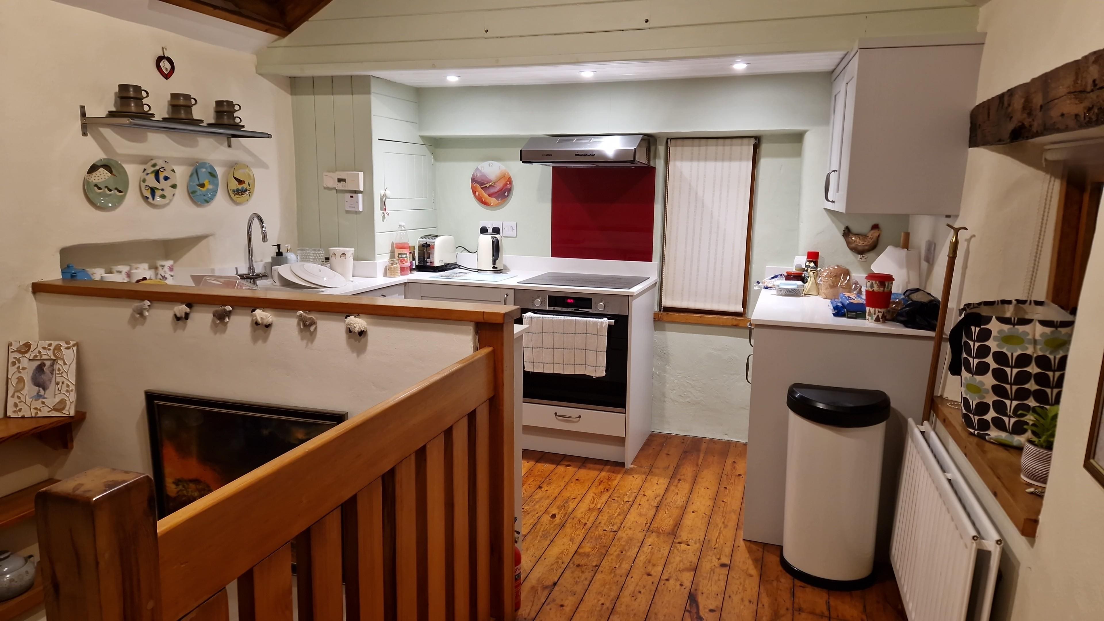 Kitchen and the top of the stairs