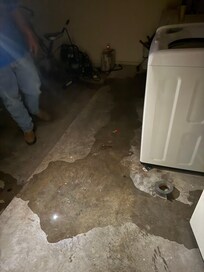Water in garage from master bathtub