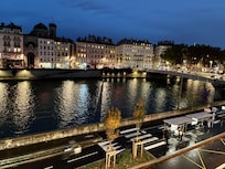 Night view from my room overlooking the Saone River.