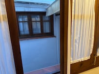 Tiny courtyard below but at least this provides some natural light into room 8.