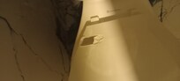 Broken toilet seat cover in rm #3
