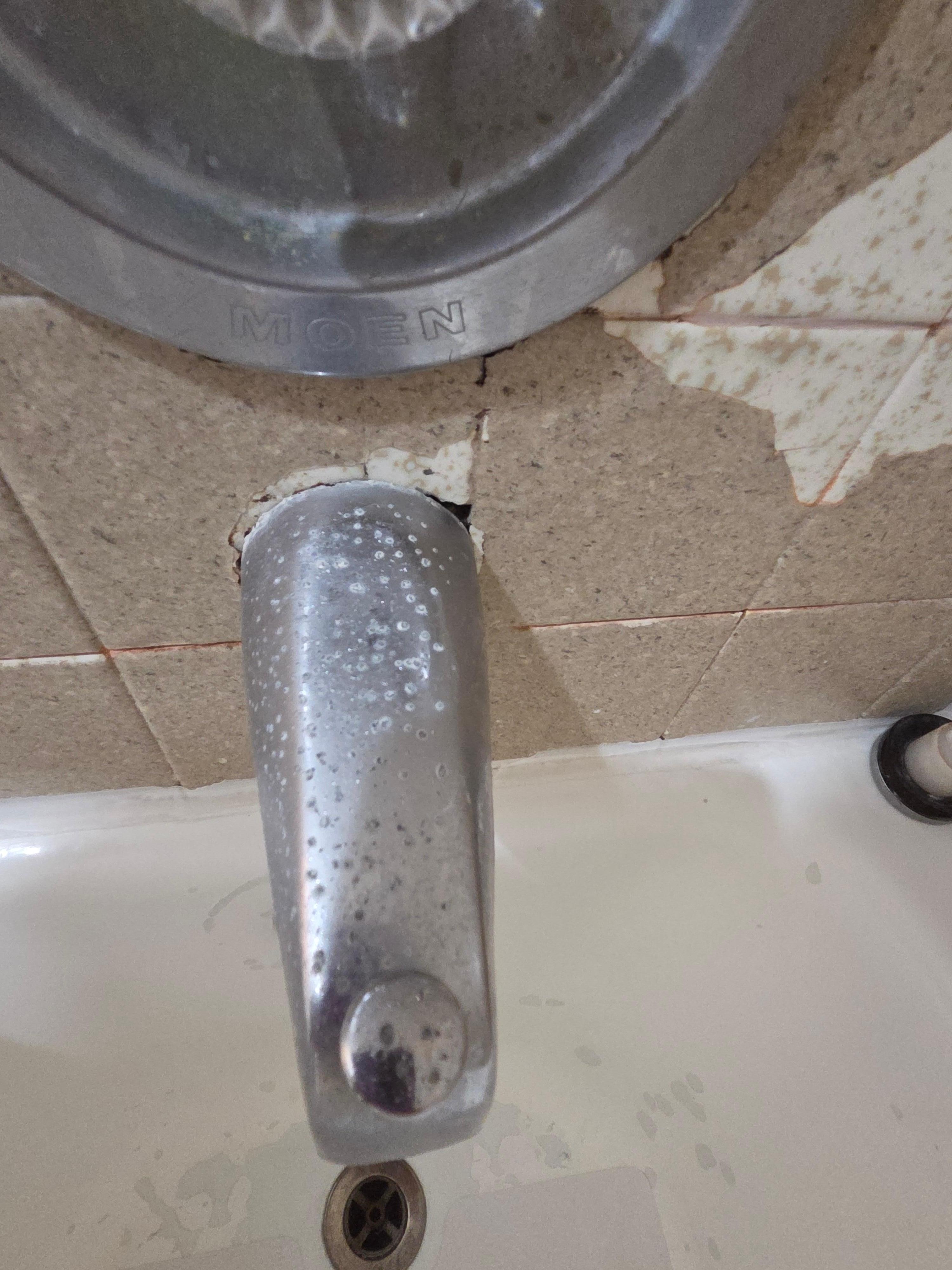 Rusty facet and peeling tile