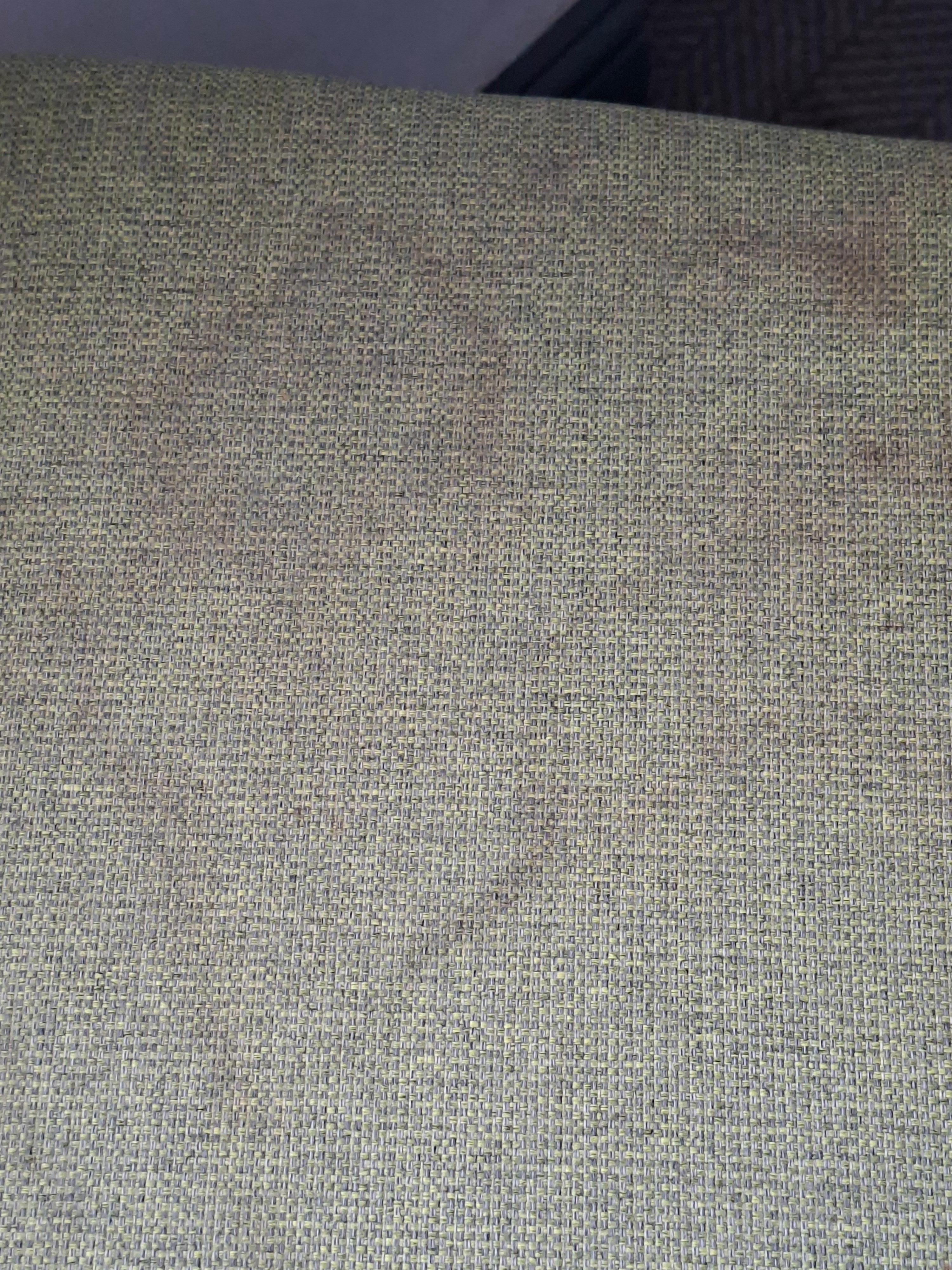 Chair seat cover stained with " something?"Covered it with a towel when I used it.