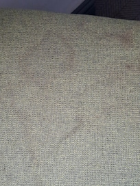 Chair seat cover stained with " something?"Covered it with a towel when I used it.