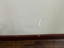 Gouges in wall