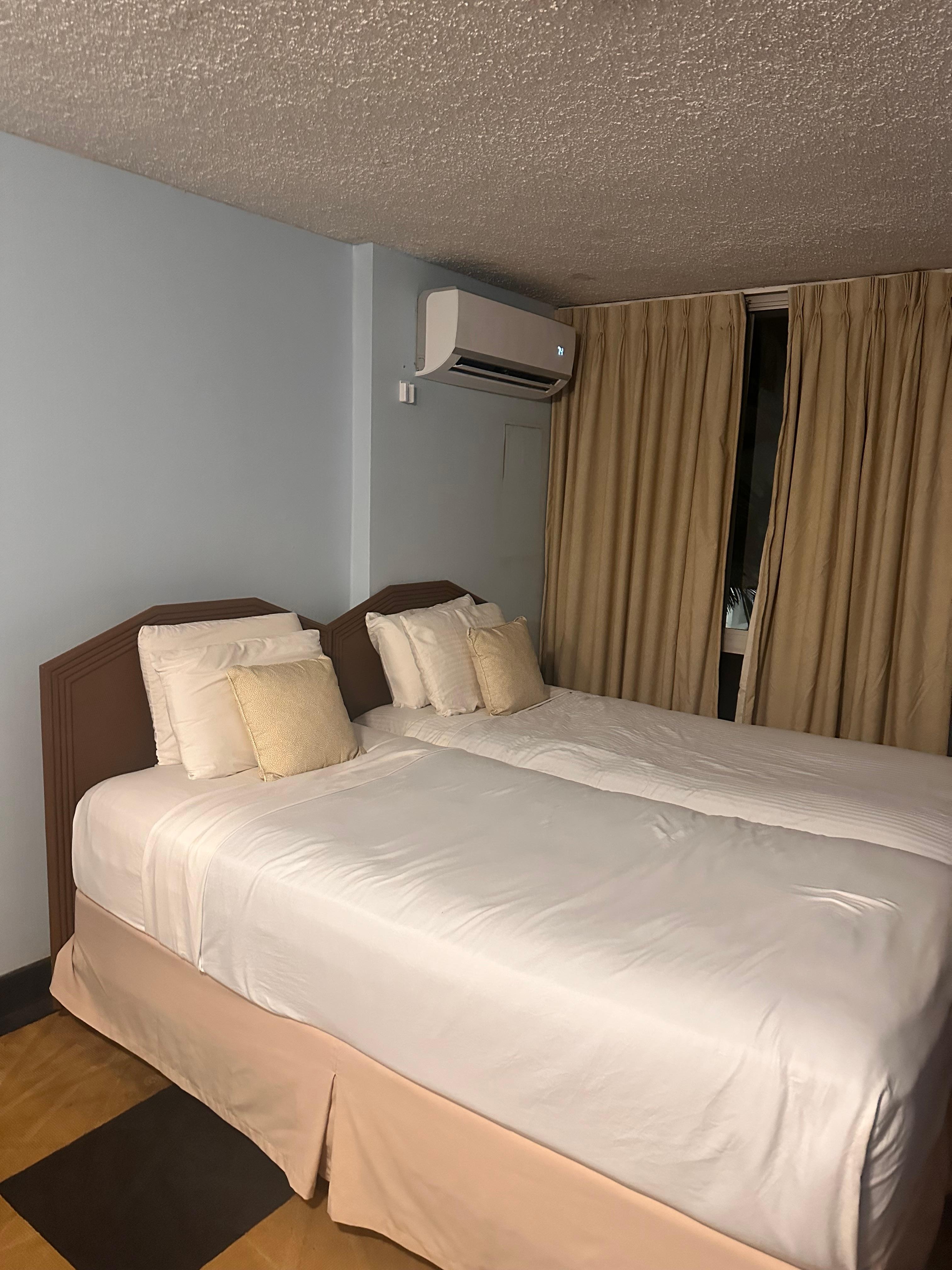 the two twin beds we had to push together.