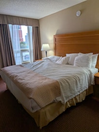 King bed, mattress topper needs to be changed out very hard
